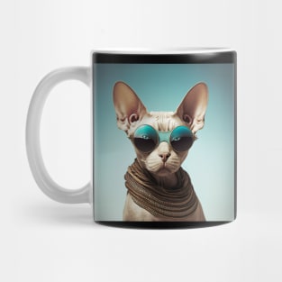 Concentrated sphinx cat with glasses looks at the camera on a blue background Mug